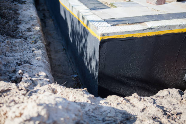 Professional Interior Drainage System technician working in Brighton, MI